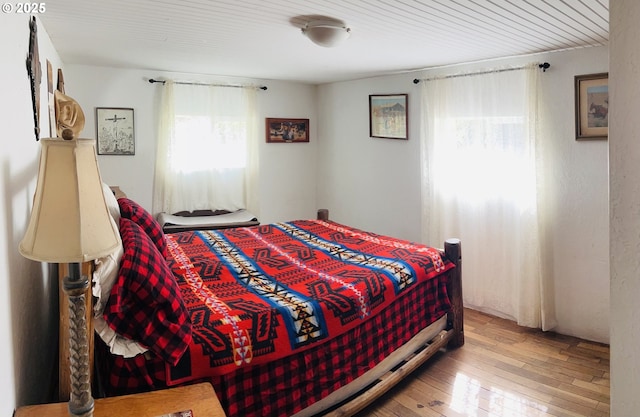 42799 Leaburg Dr, Walterville, OR 97489 - bedroom featuring hardwood / wood-style floors and multiple windows