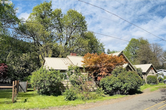 42799 Leaburg Dr, Walterville, OR 97489 - view of home's exterior featuring fence and metal roof