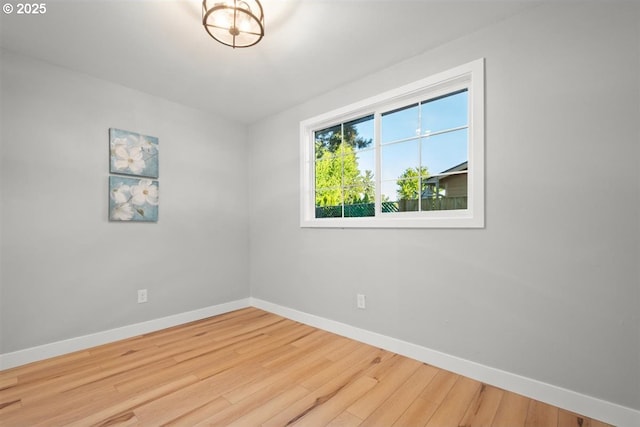 2450 Eddy Ave NE, Salem, OR 97301 - spare room with baseboards and wood finished floors