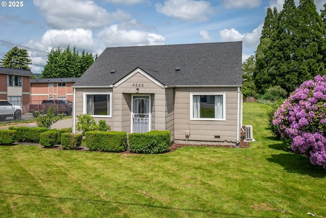 4656 Ocean Beach Hwy, Longview, WA 98632 - view of front of house with a front yard, roof with shingles, and crawl space