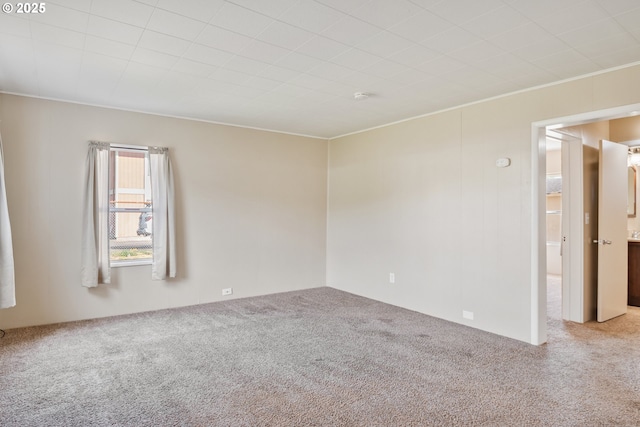4656 Ocean Beach Hwy, Longview, WA 98632 - spare room with carpet floors, a smoke detector, and ornamental molding