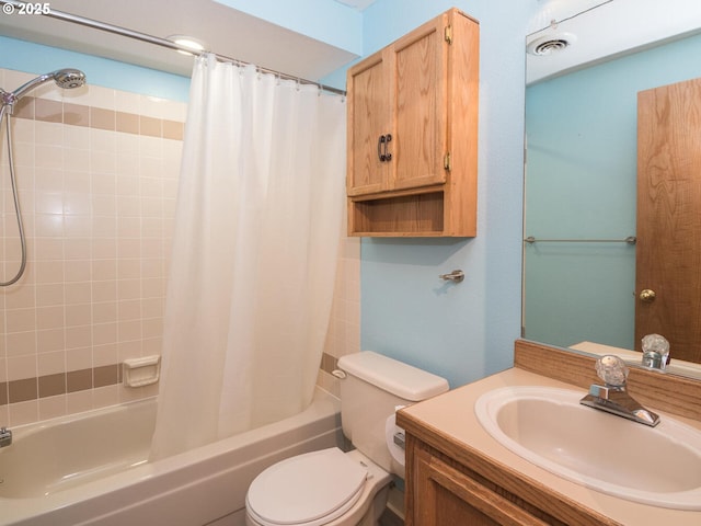 full bathroom with vanity, toilet, and shower / bath combo with shower curtain