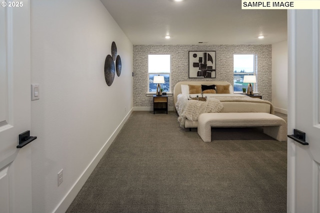 1403 N 41st Pl, Ridgefield, WA 98642 - bedroom with baseboards and dark carpet