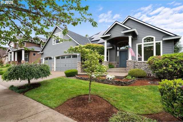 14925 SE Pebble Beach Dr, Happy Valley, OR 97086 - craftsman house featuring a front lawn, stone siding, concrete driveway, and a garage