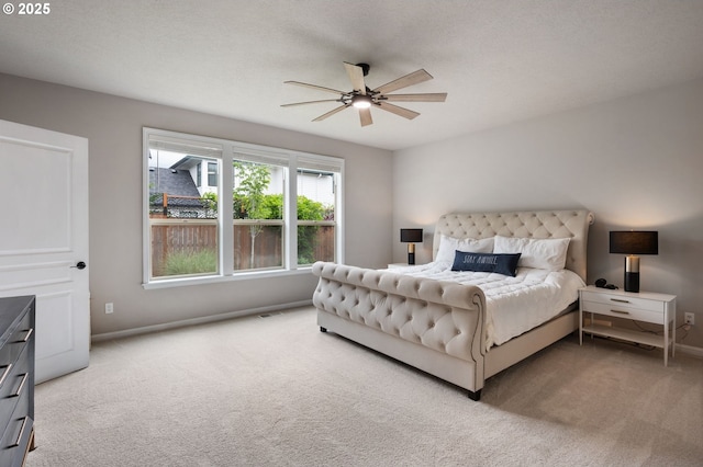 14925 SE Pebble Beach Dr, Happy Valley, OR 97086 - carpeted bedroom featuring baseboards and a ceiling fan