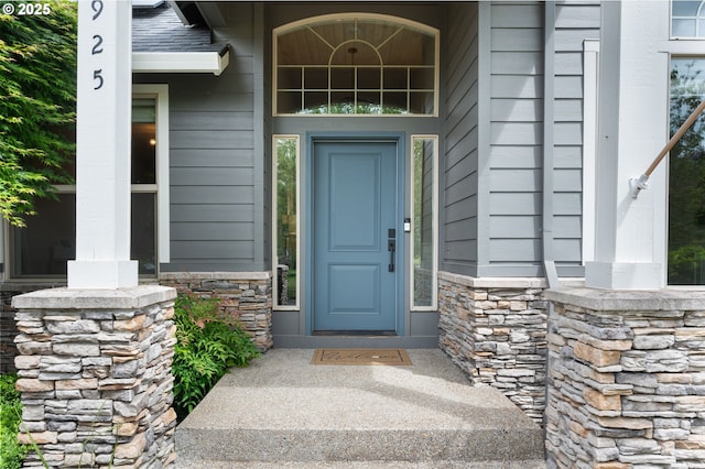 14925 SE Pebble Beach Dr, Happy Valley, OR 97086 - view of exterior entry with stone siding