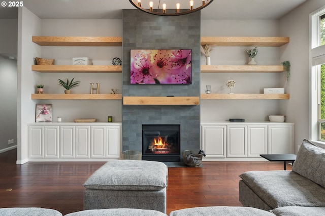 14925 SE Pebble Beach Dr, Happy Valley, OR 97086 - living area featuring dark wood-type flooring, a tile fireplace, and a chandelier