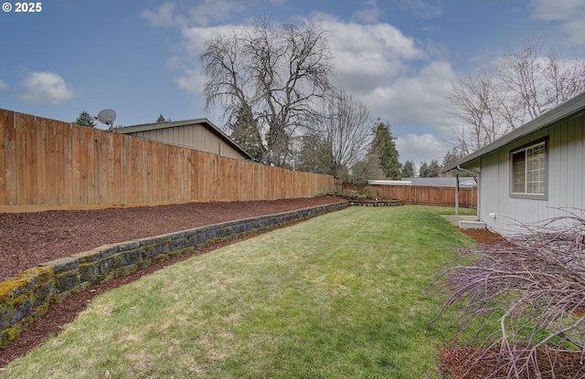 view of yard featuring a fenced backyard