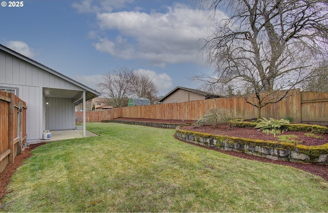 view of yard with a fenced backyard and a patio area