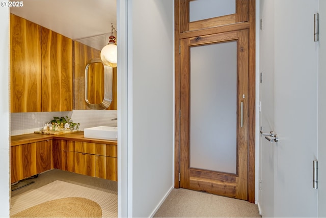 2530 SE 26th Ave Unit 401, Portland, OR 97202 - bathroom with tasteful backsplash and vanity