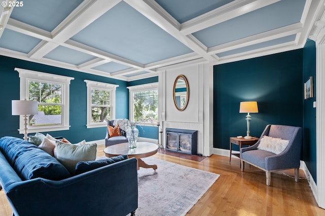 1001 NW Despain Ave, Pendleton, OR 97801 - living room featuring coffered ceiling, a fireplace, wood finished floors, beamed ceiling, and baseboards