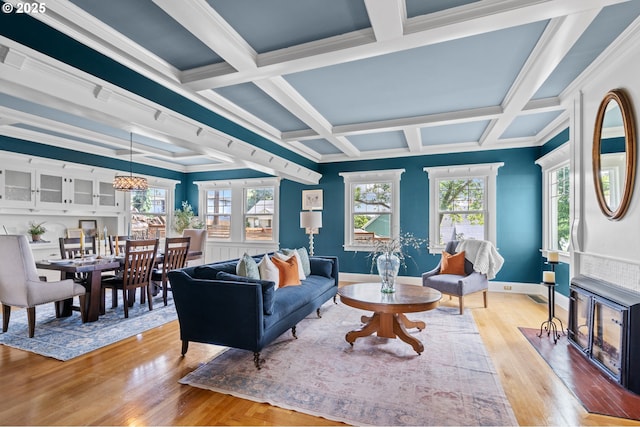 1001 NW Despain Ave, Pendleton, OR 97801 - living area with light wood-style floors, baseboards, coffered ceiling, ornamental molding, and beam ceiling