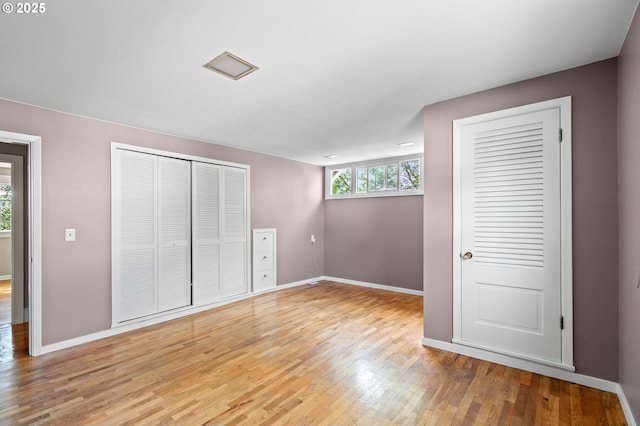 1001 NW Despain Ave, Pendleton, OR 97801 - unfurnished bedroom with light wood-style flooring, baseboards, and a closet
