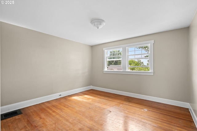 1001 NW Despain Ave, Pendleton, OR 97801 - unfurnished room with baseboards and light wood-style flooring