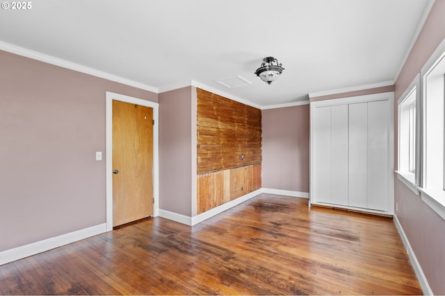 1001 NW Despain Ave, Pendleton, OR 97801 - spare room featuring wood finished floors, baseboards, and crown molding