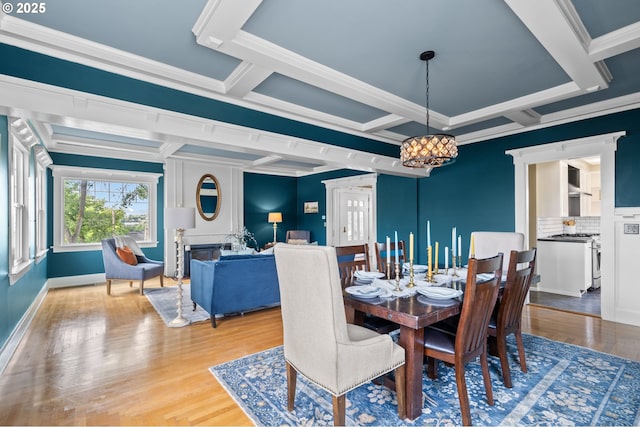 1001 NW Despain Ave, Pendleton, OR 97801 - dining room with a chandelier, coffered ceiling, wood finished floors, crown molding, and beam ceiling