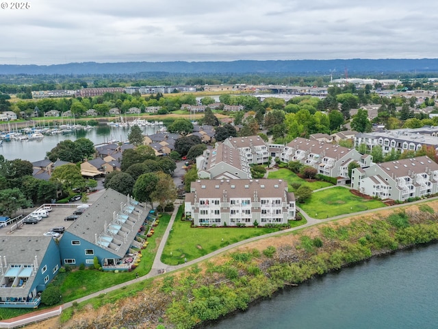 aerial view with a water view and a residential view