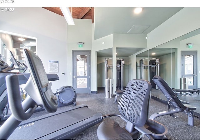 gym featuring wood ceiling