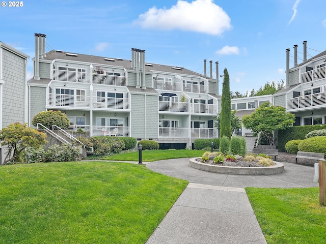 view of community with a lawn