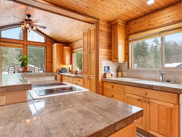 24940 E Tillicum St, Welches, OR 97067 - kitchen with a sink, plenty of natural light, wood ceiling, tile countertops, and a ceiling fan