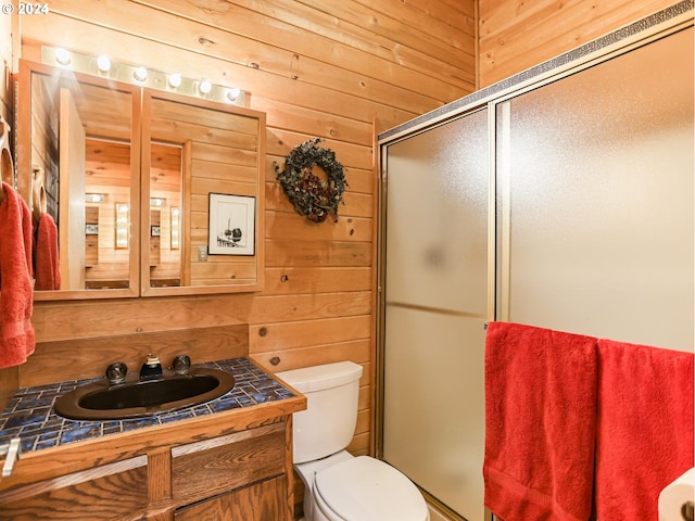 24940 E Tillicum St, Welches, OR 97067 - full bath with toilet, a shower stall, vanity, and wooden walls