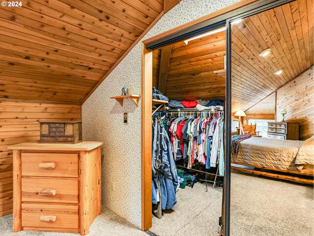 24940 E Tillicum St, Welches, OR 97067 - walk in closet featuring lofted ceiling and carpet floors
