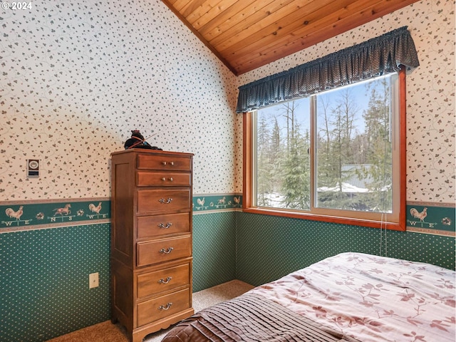 24940 E Tillicum St, Welches, OR 97067 - carpeted bedroom featuring wallpapered walls, vaulted ceiling, wood ceiling, and wainscoting