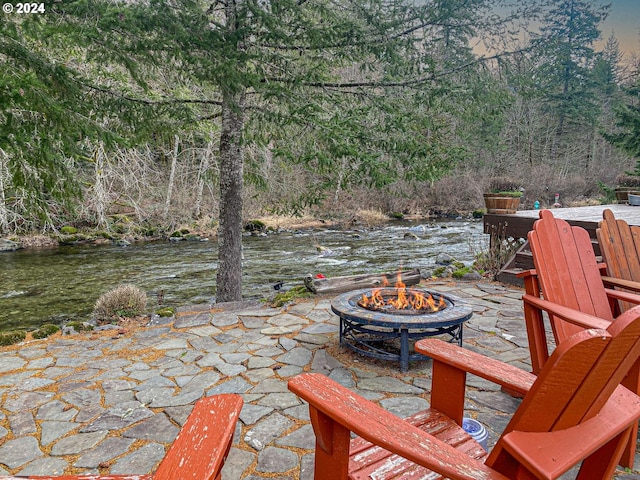 24940 E Tillicum St, Welches, OR 97067 - view of patio / terrace with a fire pit