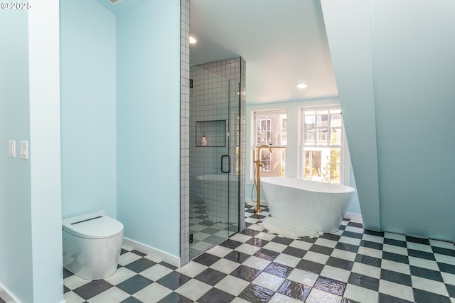 full bathroom with a shower stall, toilet, a soaking tub, baseboards, and recessed lighting