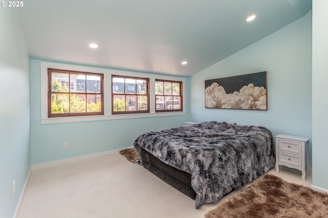 carpeted bedroom featuring recessed lighting, baseboards, and lofted ceiling