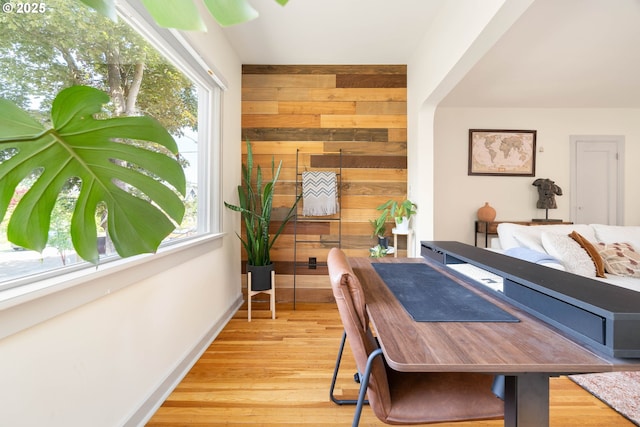 6232 NE 6th Ave, Portland, OR 97211 - dining space featuring wooden walls, wood finished floors, and baseboards