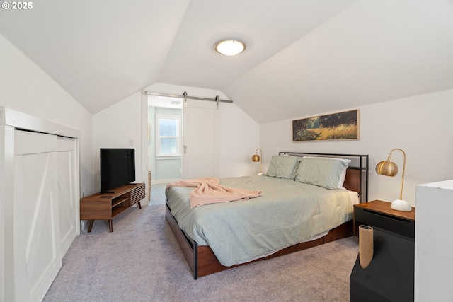 6232 NE 6th Ave, Portland, OR 97211 - bedroom with carpet, lofted ceiling, and a barn door
