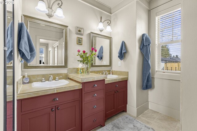 full bathroom featuring double vanity