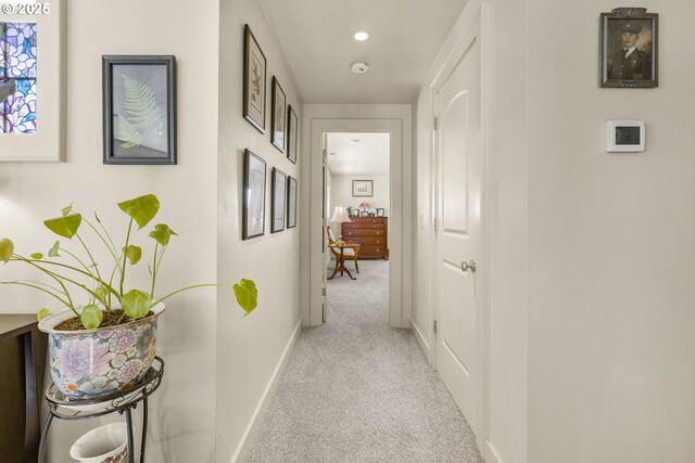 bathroom with toilet and baseboards
