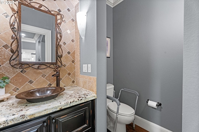 9641 SE Nicholas Dr, Happy Valley, OR 97086 - half bath featuring vanity, crown molding, and tasteful backsplash