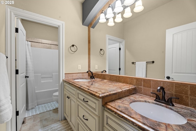 9641 SE Nicholas Dr, Happy Valley, OR 97086 - bathroom with double vanity, shower / tub combo with curtain, tile patterned floors, and backsplash