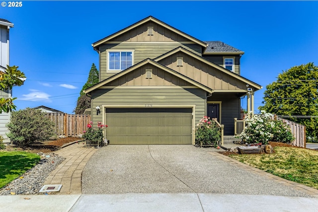 51276 SW Rembrandt Dr, Scappoose, OR 97056 - view of front of home with board and batten siding, concrete driveway, and covered porch