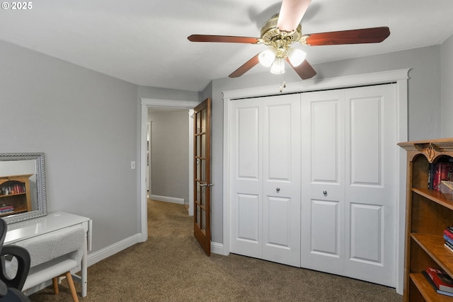 carpeted office with ceiling fan