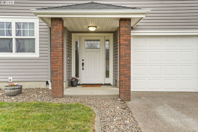 entrance to property featuring a garage