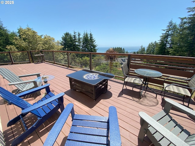 97661 Marina Heights Loop, Brookings, OR 97415 - deck with an outdoor fire pit