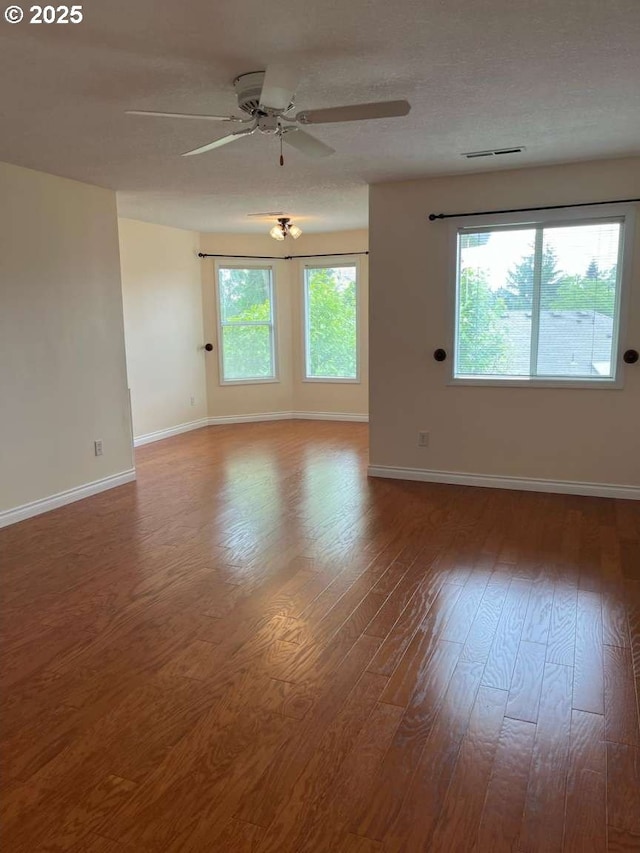 3553 NW 163rd Ct, Beaverton, OR 97006 - empty room with ceiling fan and wood finished floors