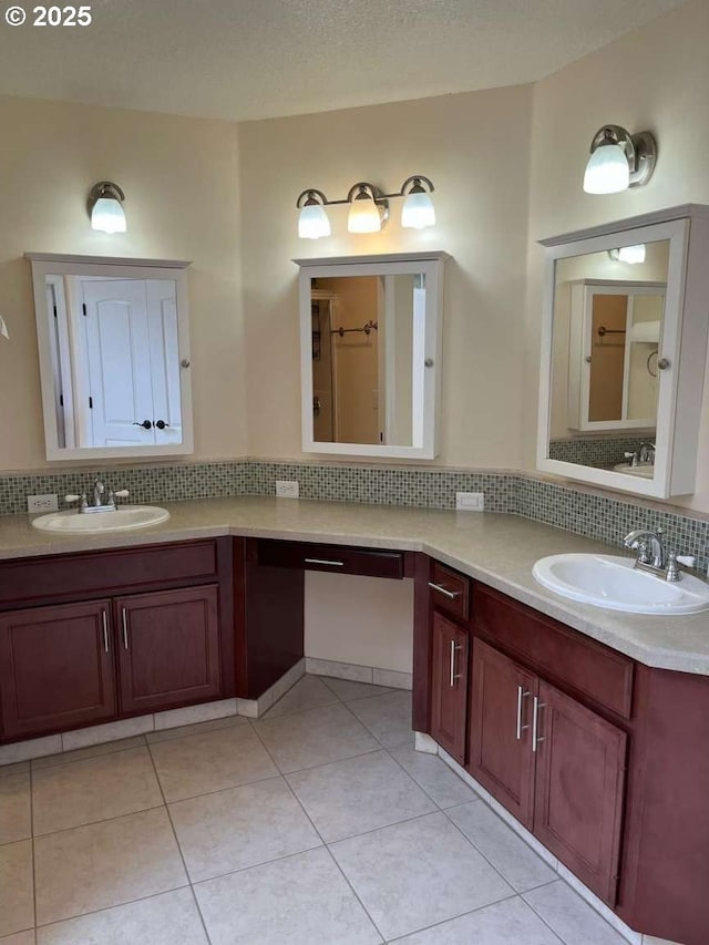3553 NW 163rd Ct, Beaverton, OR 97006 - bathroom featuring backsplash, double vanity, and tile patterned flooring