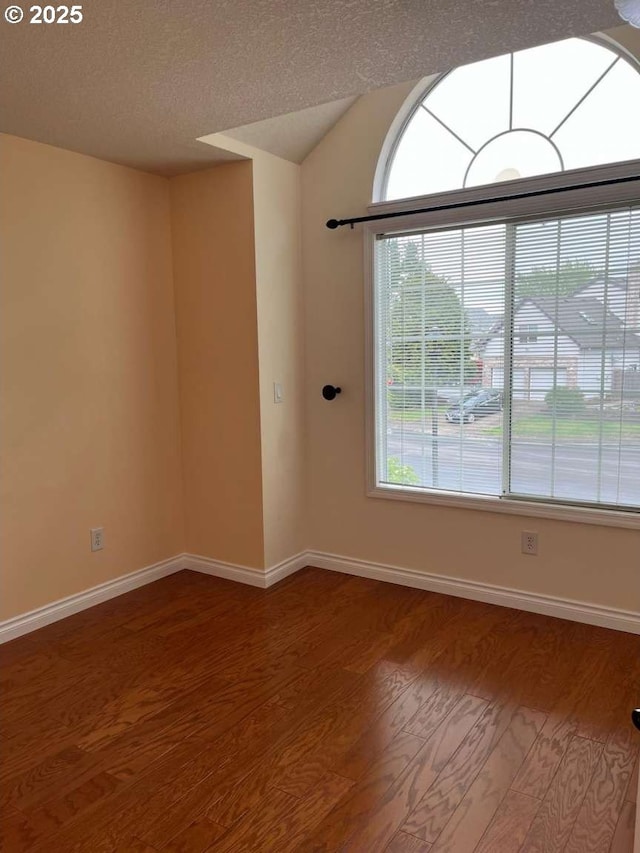 3553 NW 163rd Ct, Beaverton, OR 97006 - unfurnished room with wood finished floors and a textured ceiling