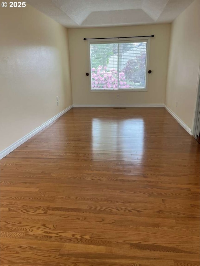 3553 NW 163rd Ct, Beaverton, OR 97006 - unfurnished room with wood finished floors and baseboards