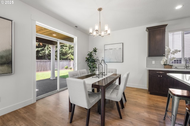 2522 S Lydia Loop, Hubbard, OR 97032 - dining space featuring a chandelier, light wood-style floors, baseboards, and recessed lighting