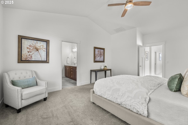 2522 S Lydia Loop, Hubbard, OR 97032 - bedroom featuring lofted ceiling, light carpet, baseboards, ensuite bath, and ceiling fan