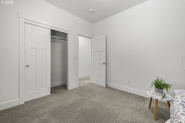 2522 S Lydia Loop, Hubbard, OR 97032 - unfurnished bedroom featuring carpet flooring, a closet, and baseboards