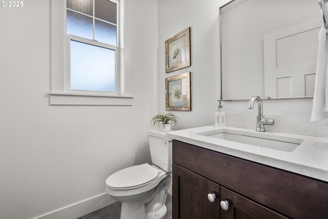 2522 S Lydia Loop, Hubbard, OR 97032 - bathroom featuring toilet, vanity, baseboards, and tile patterned floors