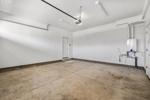 2522 S Lydia Loop, Hubbard, OR 97032 - garage featuring a garage door opener, water heater, and baseboards