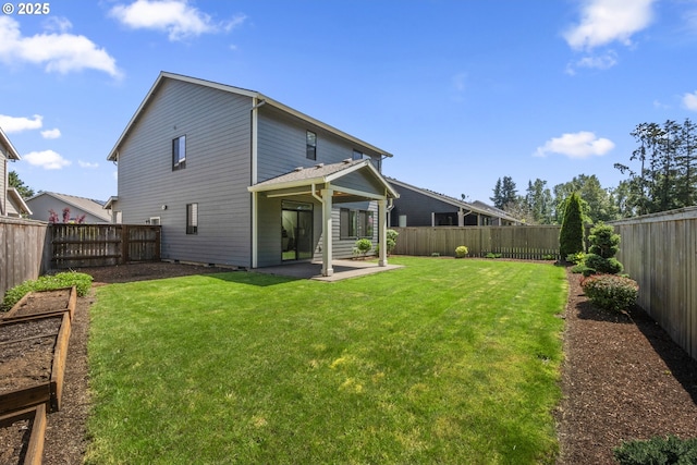 2522 S Lydia Loop, Hubbard, OR 97032 - rear view of property featuring a patio area and a garden